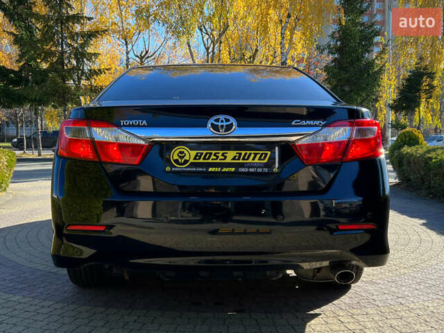 Черный Тойота Камри, объемом двигателя 2.49 л и пробегом 260 тыс. км за 13750 $, фото 5 на Automoto.ua