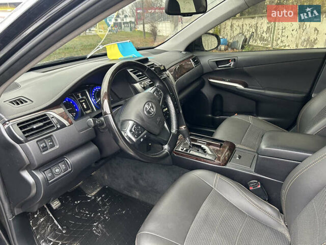 Чорний Тойота Камрі, об'ємом двигуна 2.49 л та пробігом 124 тис. км за 17000 $, фото 6 на Automoto.ua