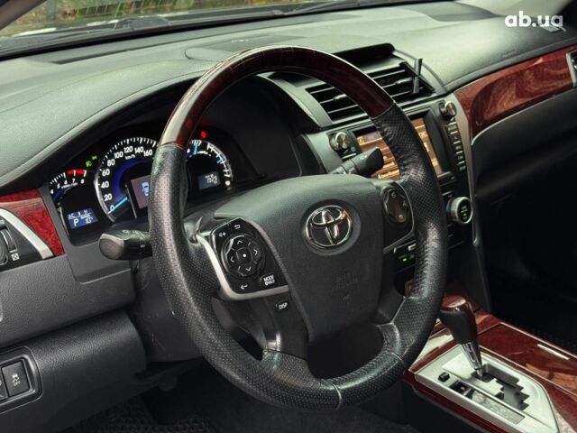 Черный Тойота Камри, объемом двигателя 2.5 л и пробегом 257 тыс. км за 13990 $, фото 18 на Automoto.ua