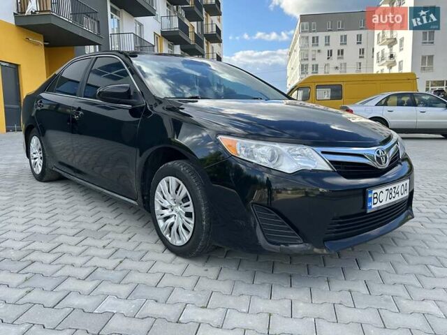 Черный Тойота Камри, объемом двигателя 2.49 л и пробегом 195 тыс. км за 11250 $, фото 7 на Automoto.ua