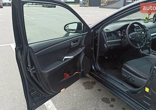 Чорний Тойота Камрі, об'ємом двигуна 2.49 л та пробігом 195 тис. км за 12100 $, фото 14 на Automoto.ua