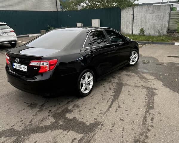 Черный Тойота Камри, объемом двигателя 2.5 л и пробегом 240 тыс. км за 14000 $, фото 9 на Automoto.ua