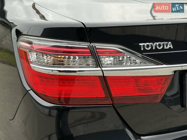 Черный Тойота Камри, объемом двигателя 2.5 л и пробегом 153 тыс. км за 16700 $, фото 18 на Automoto.ua