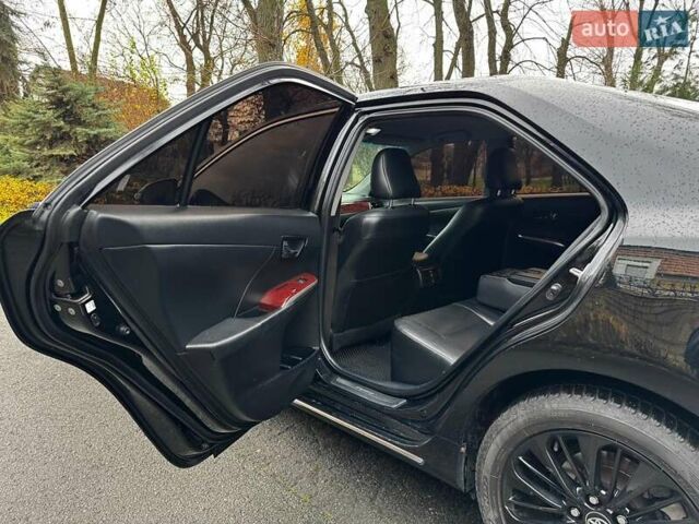 Черный Тойота Камри, объемом двигателя 2.5 л и пробегом 257 тыс. км за 13990 $, фото 30 на Automoto.ua