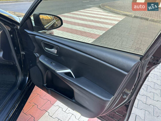 Черный Тойота Камри, объемом двигателя 2.49 л и пробегом 97 тыс. км за 12800 $, фото 29 на Automoto.ua
