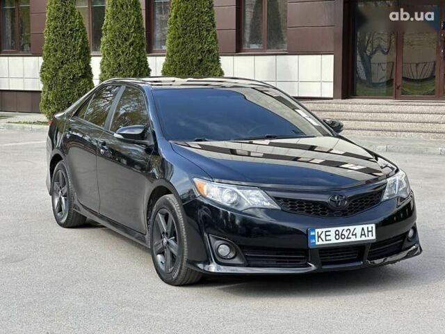 Черный Тойота Камри, объемом двигателя 2.5 л и пробегом 180 тыс. км за 11999 $, фото 19 на Automoto.ua