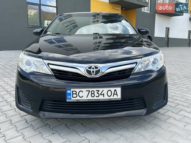 Черный Тойота Камри, объемом двигателя 2.49 л и пробегом 195 тыс. км за 11250 $, фото 8 на Automoto.ua