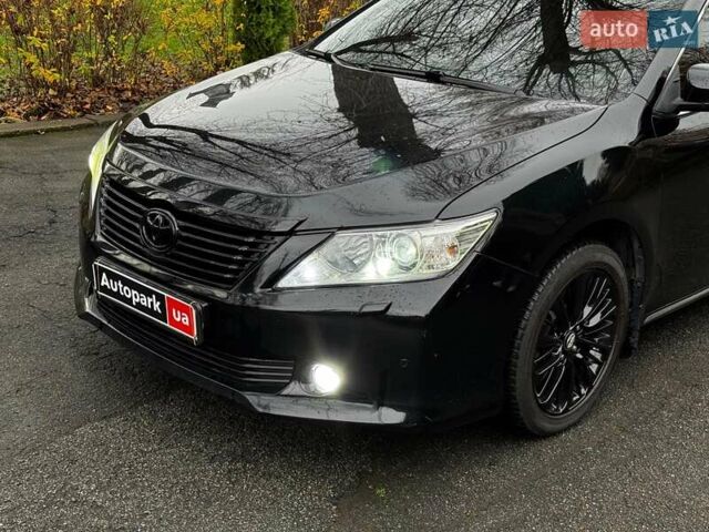 Черный Тойота Камри, объемом двигателя 2.5 л и пробегом 257 тыс. км за 13990 $, фото 3 на Automoto.ua