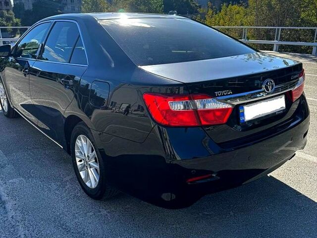 Черный Тойота Камри, объемом двигателя 2.5 л и пробегом 128 тыс. км за 15000 $, фото 3 на Automoto.ua