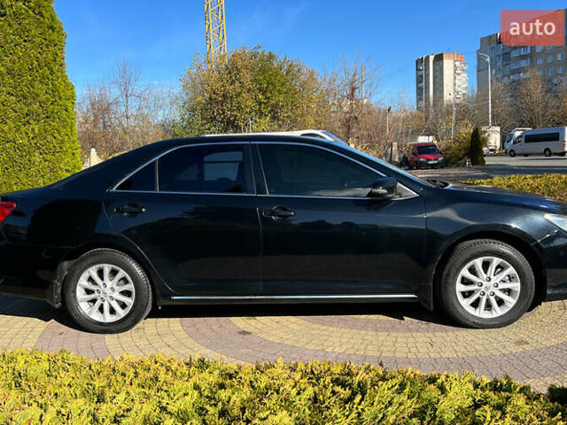 Черный Тойота Камри, объемом двигателя 2.49 л и пробегом 260 тыс. км за 13750 $, фото 7 на Automoto.ua