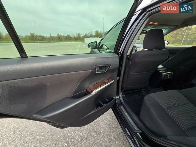 Черный Тойота Камри, объемом двигателя 2.49 л и пробегом 206 тыс. км за 14300 $, фото 12 на Automoto.ua