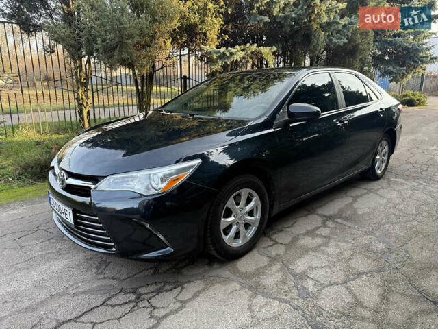 Черный Тойота Камри, объемом двигателя 2.5 л и пробегом 200 тыс. км за 12200 $, фото 2 на Automoto.ua