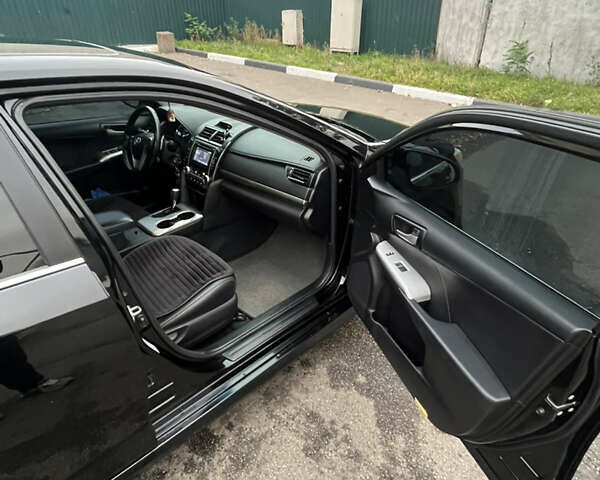 Черный Тойота Камри, объемом двигателя 2.5 л и пробегом 240 тыс. км за 14000 $, фото 22 на Automoto.ua