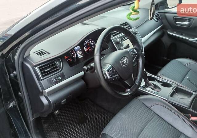 Чорний Тойота Камрі, об'ємом двигуна 2.49 л та пробігом 195 тис. км за 12100 $, фото 16 на Automoto.ua