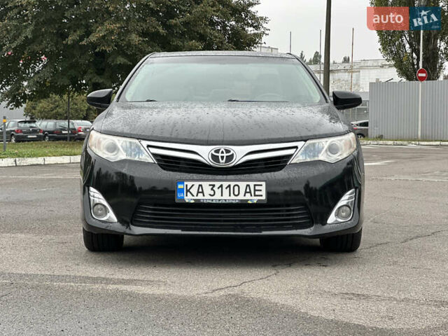 Черный Тойота Камри, объемом двигателя 2.49 л и пробегом 220 тыс. км за 10900 $, фото 1 на Automoto.ua