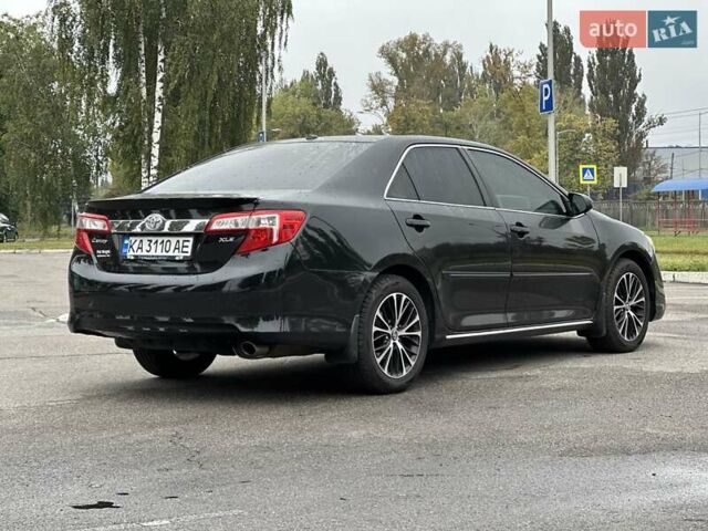 Черный Тойота Камри, объемом двигателя 2.49 л и пробегом 220 тыс. км за 12800 $, фото 4 на Automoto.ua