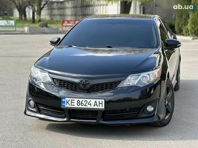 Черный Тойота Камри, объемом двигателя 2.5 л и пробегом 180 тыс. км за 11999 $, фото 1 на Automoto.ua