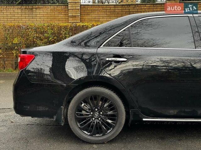 Черный Тойота Камри, объемом двигателя 2.5 л и пробегом 257 тыс. км за 13990 $, фото 6 на Automoto.ua