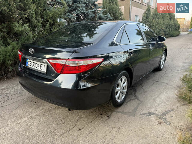 Черный Тойота Камри, объемом двигателя 2.5 л и пробегом 200 тыс. км за 12200 $, фото 7 на Automoto.ua