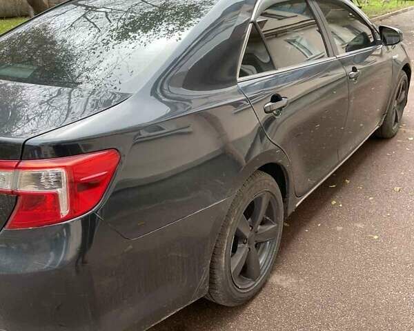 Черный Тойота Камри, объемом двигателя 2.5 л и пробегом 211 тыс. км за 12000 $, фото 5 на Automoto.ua