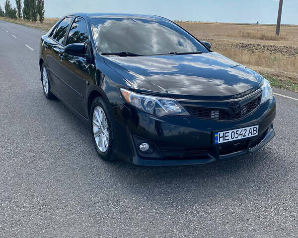 Чорний Тойота Камрі, об'ємом двигуна 2.49 л та пробігом 190 тис. км за 12250 $, фото 2 на Automoto.ua