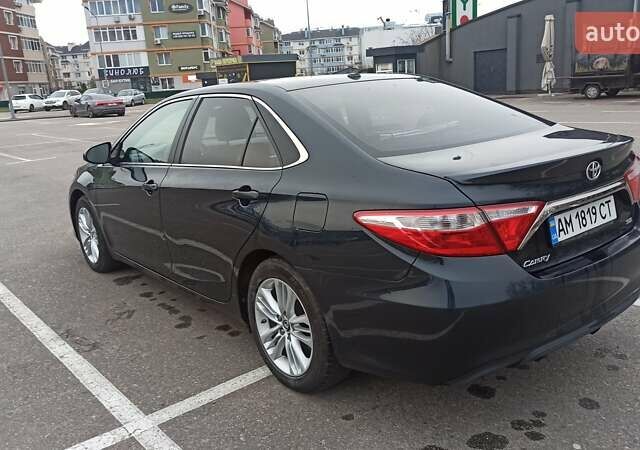 Чорний Тойота Камрі, об'ємом двигуна 2.49 л та пробігом 195 тис. км за 12100 $, фото 2 на Automoto.ua