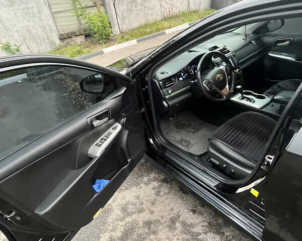 Черный Тойота Камри, объемом двигателя 2.5 л и пробегом 240 тыс. км за 14000 $, фото 18 на Automoto.ua