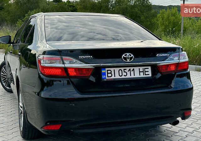 Чорний Тойота Камрі, об'ємом двигуна 2.49 л та пробігом 182 тис. км за 14999 $, фото 12 на Automoto.ua