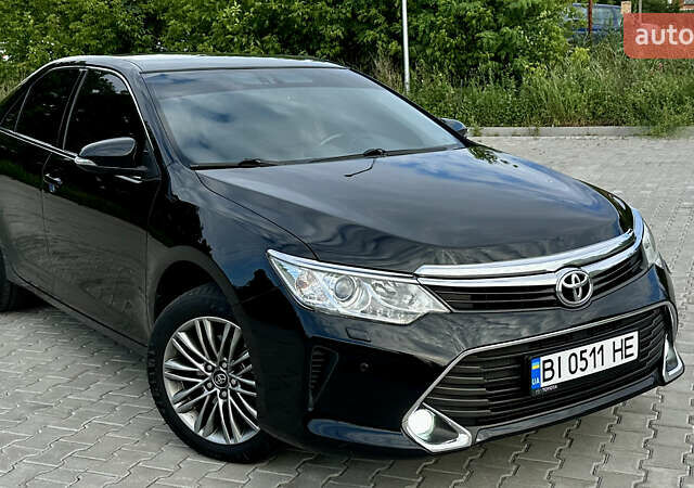 Чорний Тойота Камрі, об'ємом двигуна 2.49 л та пробігом 182 тис. км за 14999 $, фото 1 на Automoto.ua