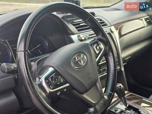 Черный Тойота Камри, объемом двигателя 2.49 л и пробегом 206 тыс. км за 14300 $, фото 1 на Automoto.ua