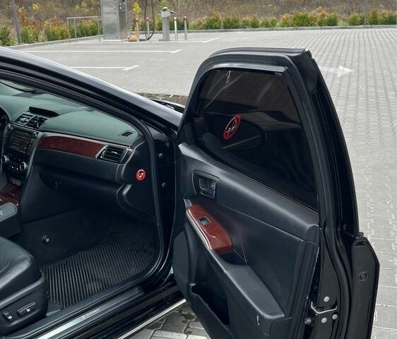 Черный Тойота Камри, объемом двигателя 2.5 л и пробегом 257 тыс. км за 15400 $, фото 17 на Automoto.ua