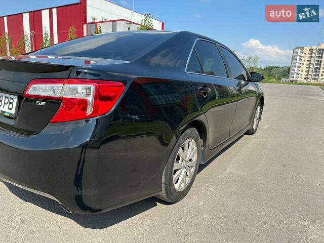 Черный Тойота Камри, объемом двигателя 2.5 л и пробегом 202 тыс. км за 13000 $, фото 7 на Automoto.ua