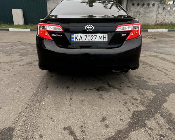 Черный Тойота Камри, объемом двигателя 2.5 л и пробегом 240 тыс. км за 14000 $, фото 11 на Automoto.ua
