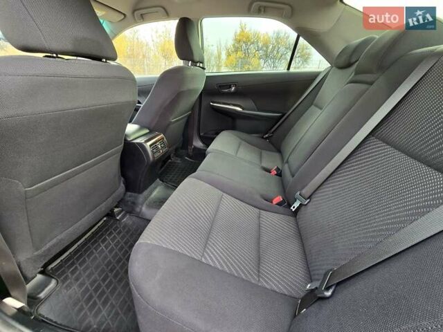 Черный Тойота Камри, объемом двигателя 2.49 л и пробегом 206 тыс. км за 14300 $, фото 14 на Automoto.ua