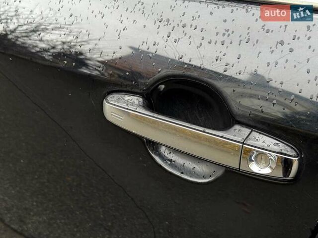 Черный Тойота Камри, объемом двигателя 2.5 л и пробегом 257 тыс. км за 13990 $, фото 14 на Automoto.ua