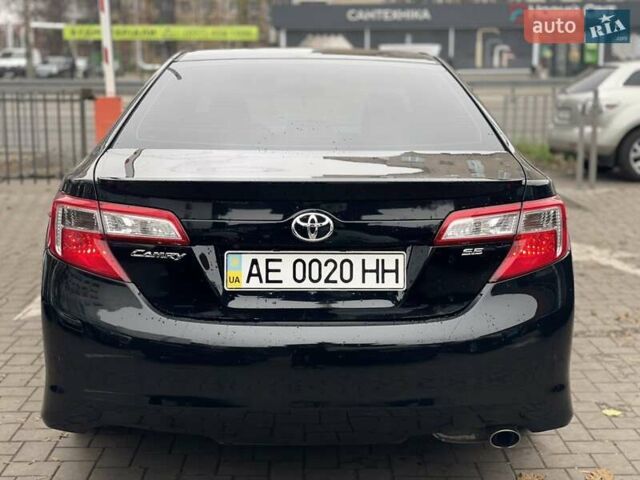 Черный Тойота Камри, объемом двигателя 2.49 л и пробегом 210 тыс. км за 12300 $, фото 4 на Automoto.ua