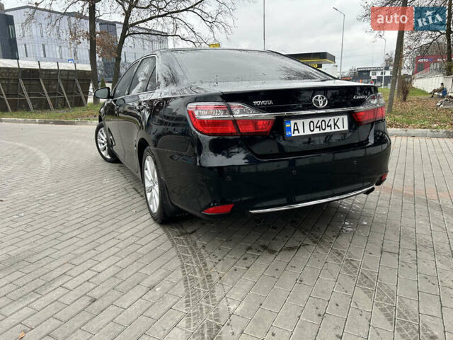 Чорний Тойота Камрі, об'ємом двигуна 2.49 л та пробігом 124 тис. км за 17000 $, фото 4 на Automoto.ua