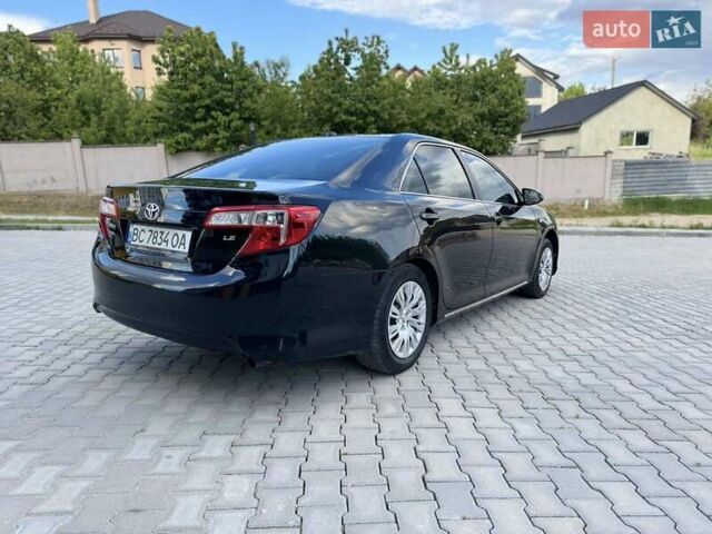 Черный Тойота Камри, объемом двигателя 2.49 л и пробегом 195 тыс. км за 11250 $, фото 6 на Automoto.ua