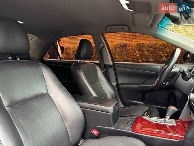 Черный Тойота Камри, объемом двигателя 2.5 л и пробегом 257 тыс. км за 13990 $, фото 33 на Automoto.ua