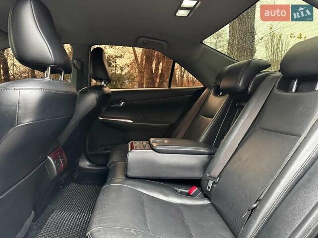 Черный Тойота Камри, объемом двигателя 2.5 л и пробегом 257 тыс. км за 13990 $, фото 27 на Automoto.ua