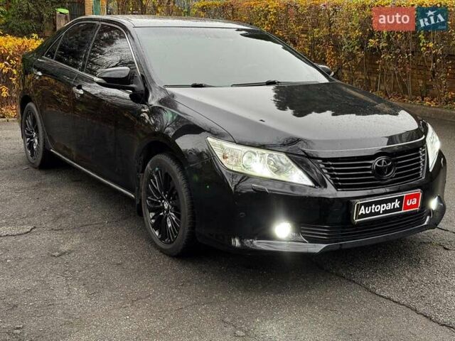 Черный Тойота Камри, объемом двигателя 2.5 л и пробегом 257 тыс. км за 13990 $, фото 2 на Automoto.ua