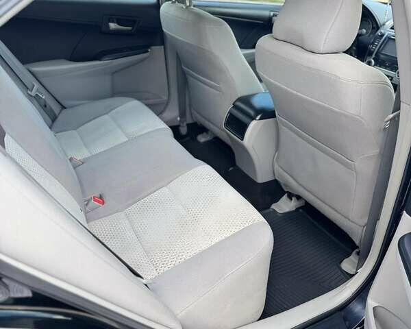 Черный Тойота Камри, объемом двигателя 2.49 л и пробегом 195 тыс. км за 11250 $, фото 14 на Automoto.ua