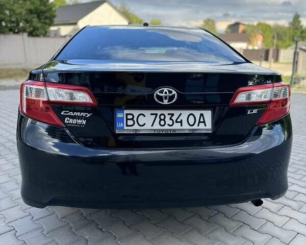 Черный Тойота Камри, объемом двигателя 2.49 л и пробегом 195 тыс. км за 11250 $, фото 5 на Automoto.ua