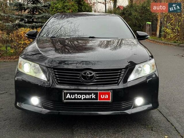 Черный Тойота Камри, объемом двигателя 2.5 л и пробегом 257 тыс. км за 13990 $, фото 1 на Automoto.ua