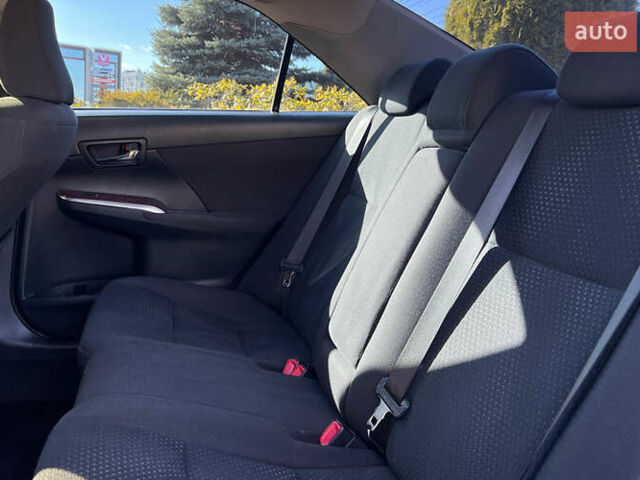 Черный Тойота Камри, объемом двигателя 2.49 л и пробегом 260 тыс. км за 13750 $, фото 18 на Automoto.ua