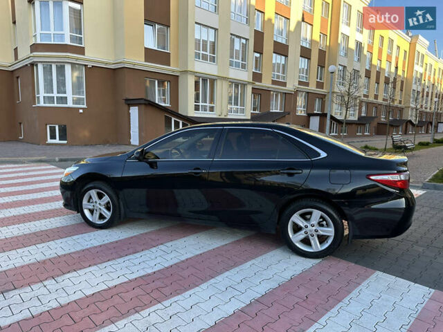Черный Тойота Камри, объемом двигателя 2.49 л и пробегом 97 тыс. км за 12800 $, фото 2 на Automoto.ua
