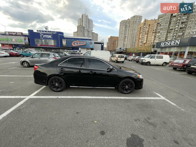 Черный Тойота Камри, объемом двигателя 2.49 л и пробегом 206 тыс. км за 11200 $, фото 8 на Automoto.ua