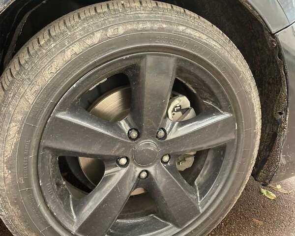 Черный Тойота Камри, объемом двигателя 2.5 л и пробегом 211 тыс. км за 12000 $, фото 4 на Automoto.ua