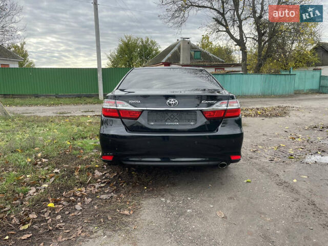 Тойота Камри 2014 в Черкассах на Automoto.ua Черный Тойота Камри, объемом двигателя 2.5 л и пробегом 189 тыс. км за 14250 $, фото 3 на Automoto.ua
