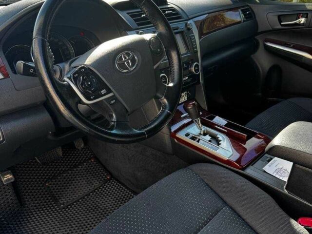 Черный Тойота Камри, объемом двигателя 2.5 л и пробегом 128 тыс. км за 15000 $, фото 1 на Automoto.ua